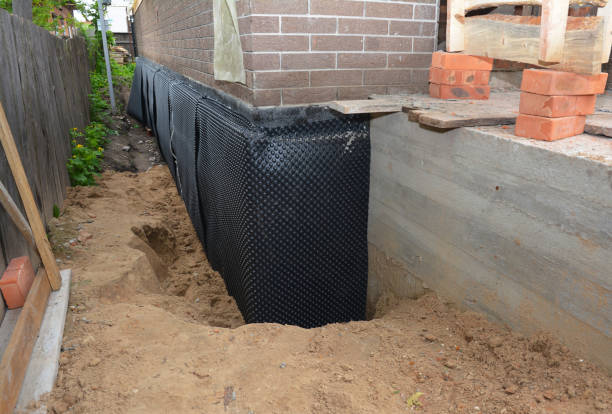 Happy homeowners after waterproofing job in Greenbelt